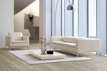 Gemütliches Schlafzimmer mit BasicFloor Laminat - Warme Holzoptik für Wohlfühlatmosphäre